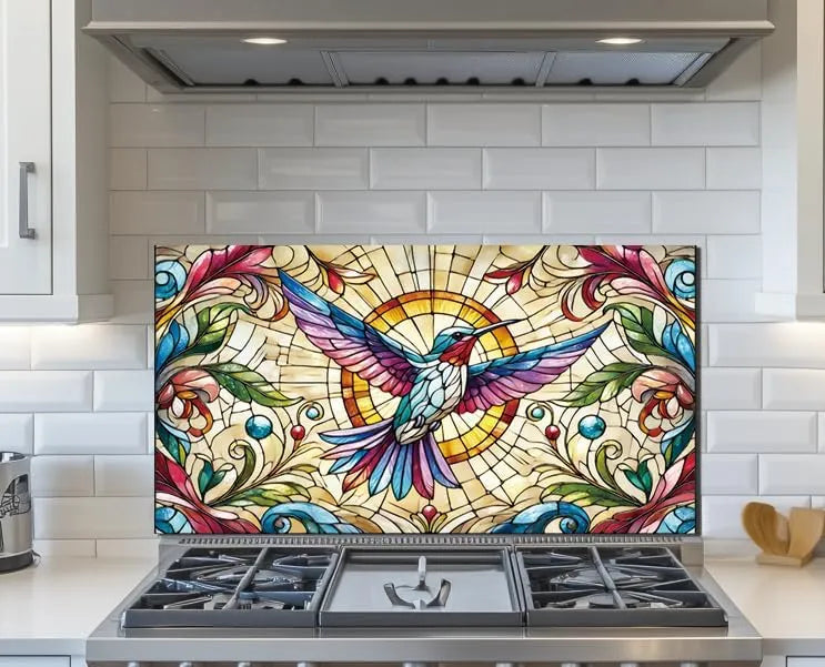 Colorful hummingbird tempered glass kitchen backsplash installed above gas stove