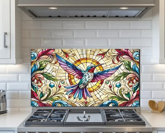 Colorful hummingbird tempered glass kitchen backsplash installed above gas stove