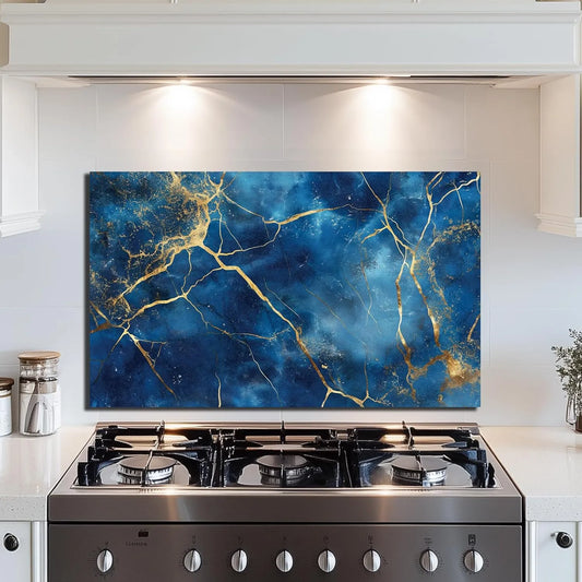 Blue gold abstract tempered glass kitchen backsplash above stainless steel stove